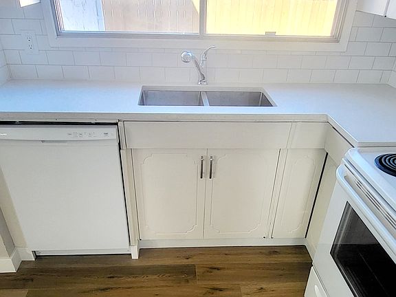Brand new dishwasher and clean appliances