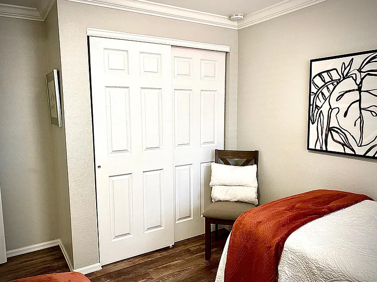 Alternate view of secondary bedroom showing closet
