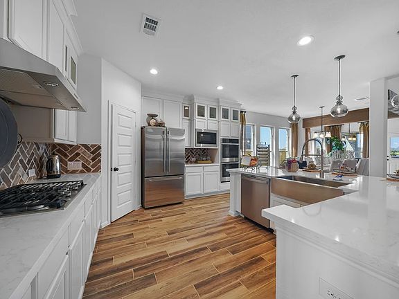 Kitchen with island and pendant lighting