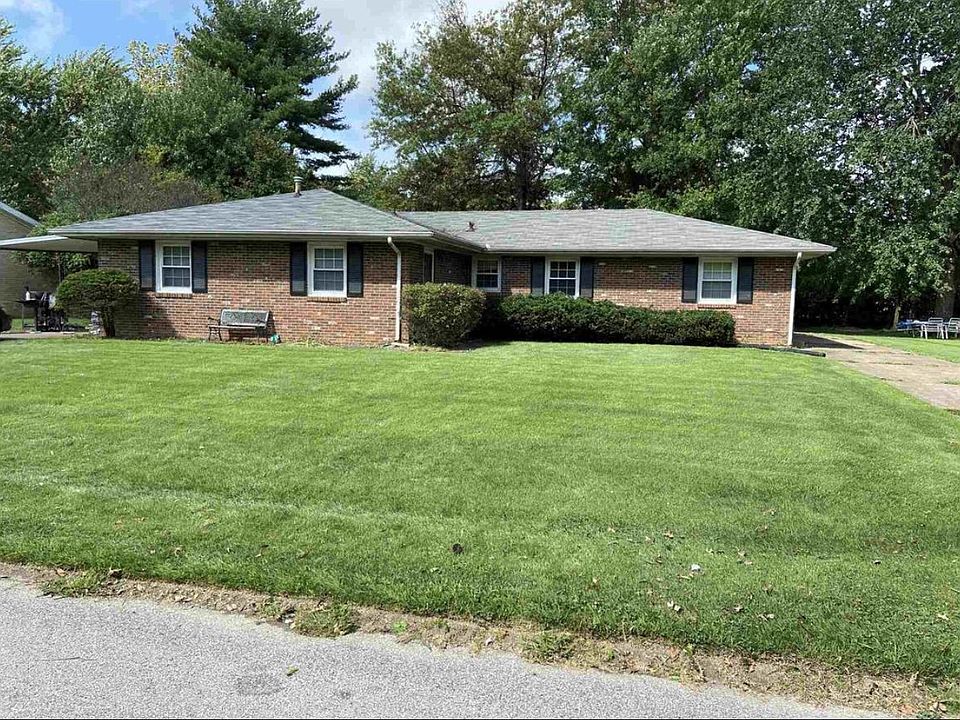 All-brick duplex with large front and back yard and off-street parking.