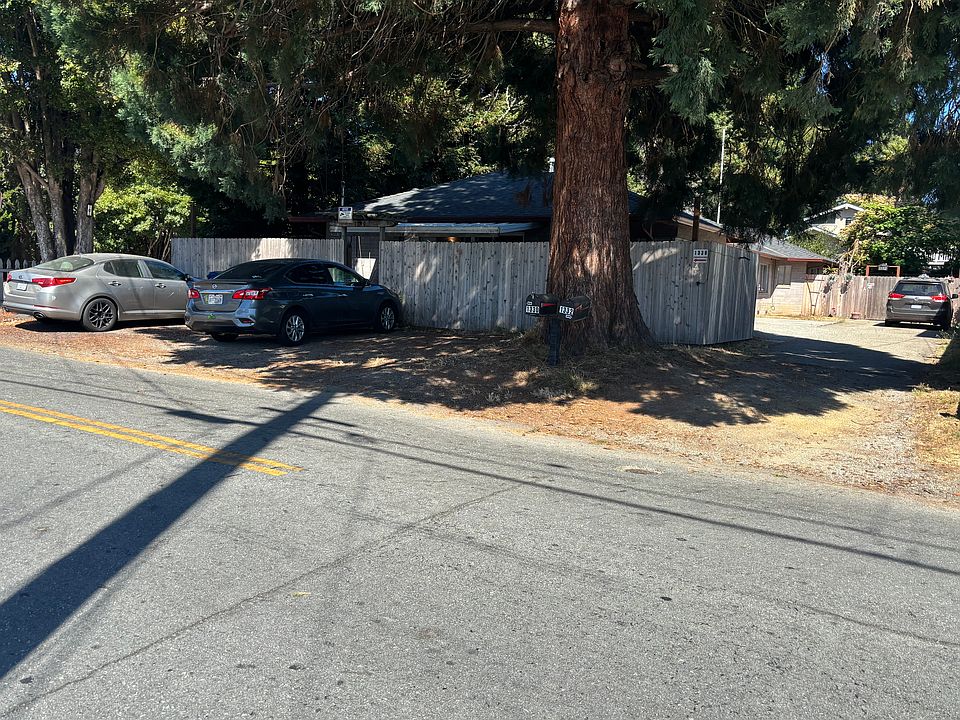 Tucked away from the street in a fantastic location close to everything, with gated entry for privacy and mature trees providing shade and landscape charm.