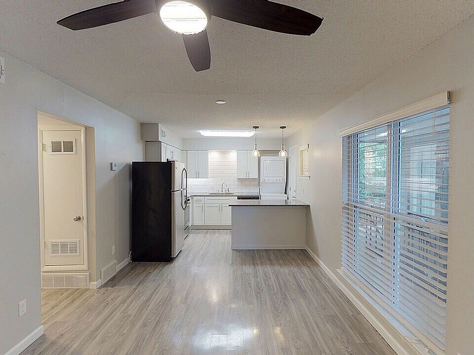 Experience contemporary living with this inviting kitchen and living space, designed for both comfort and style.