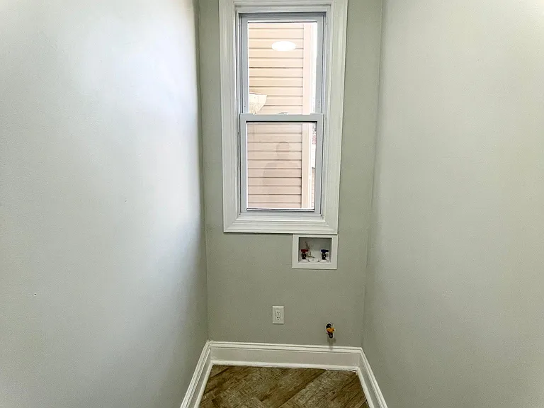 Stackable gas washer and dryer room