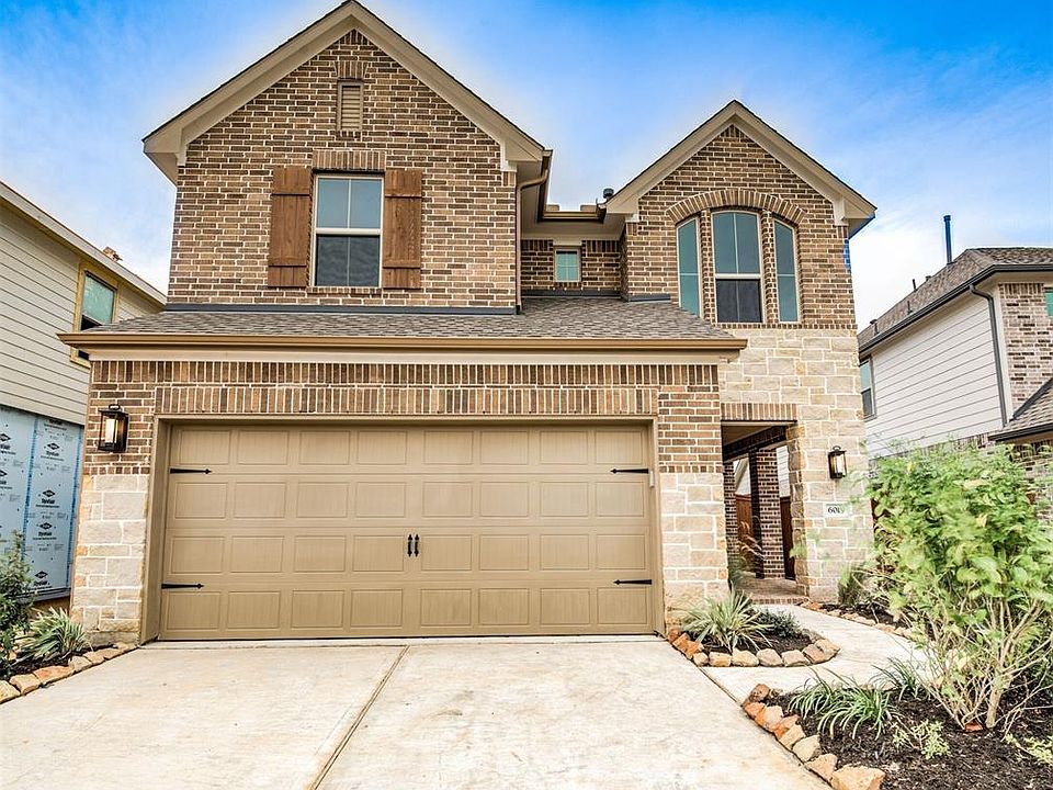 Welcome to your new home at 6019 Bridle Gate Trail! This stunning home has lovely curb appeal, a well-manicured lawn, beautiful landscaping, covered front porch, beautiful outdoor lanterns, and a double wide driveway!