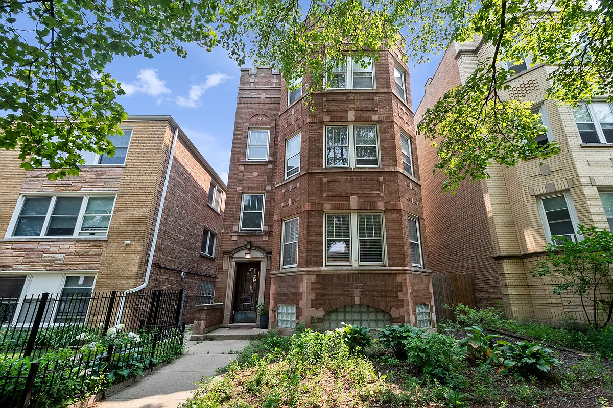 Building Photo - 5507 N Artesian Ave #1
