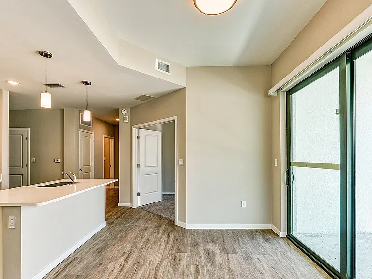 Imperial Crossing Luxury Apartment Homes unit showing a dining area off the kitchen.