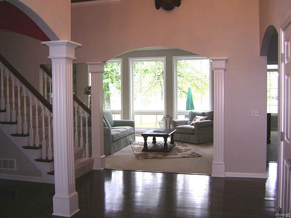 Arched doorways, beautiful hardwoods, architecturally pleasing