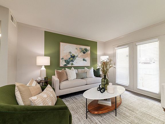 Spacious living room with hardwood-style flooring
