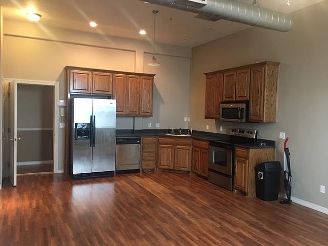 Kitchen adjacent to Living Room