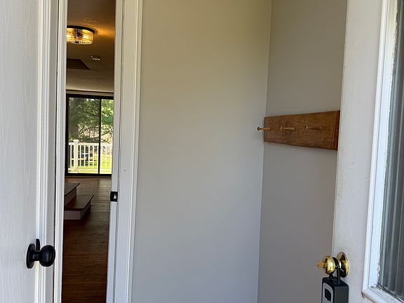 Entryway with closet/storage on left
