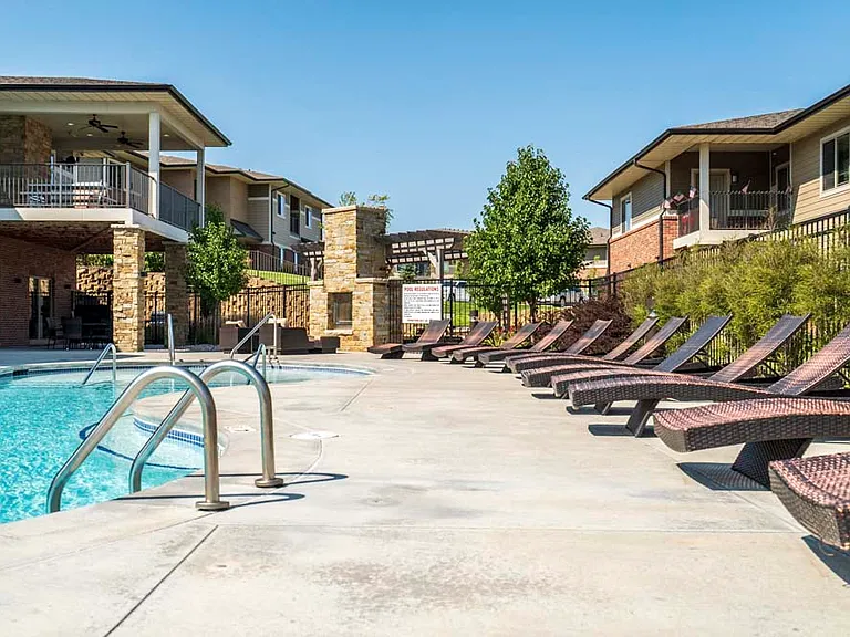 Our resort-style pool with lounge seating is the perfect place for relaxation.