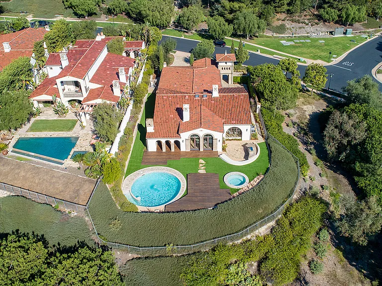 Drone view of the property - private location with round pool and spa