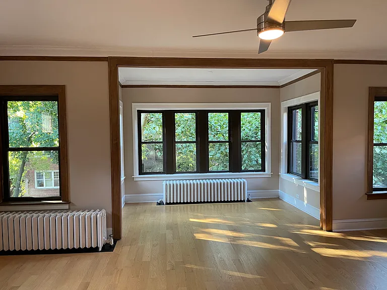 Living Room and front sun room facing the street
