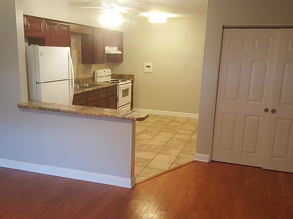 kitchen with fans, another storage area.