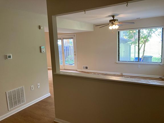 Entry way wall looking into living room
