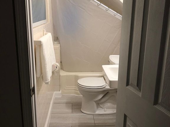 Slanted shower not ideal if you're taller than 5'7"