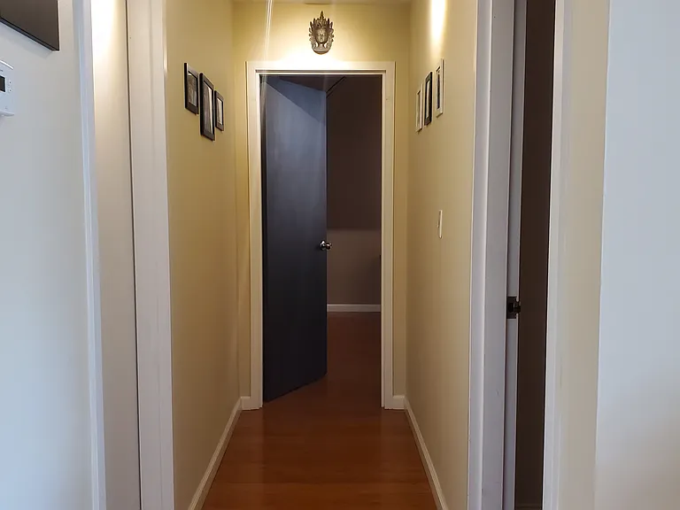 hallway to bedrooms and powder room