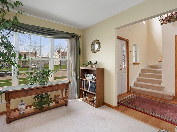 Den could be office or a formal living room!