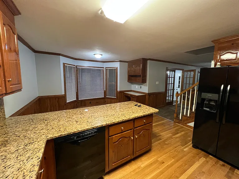 Photo of kitchen looking at the breakfast area.
