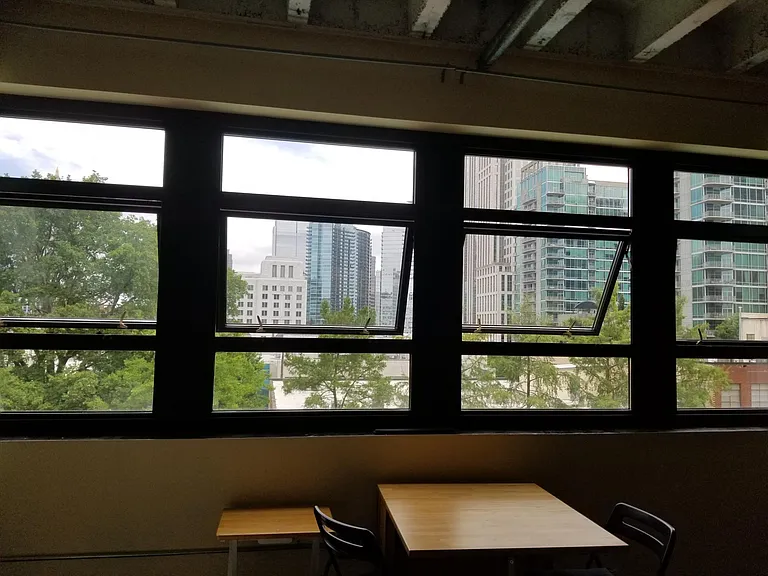 Wall of windows overlooks the pool