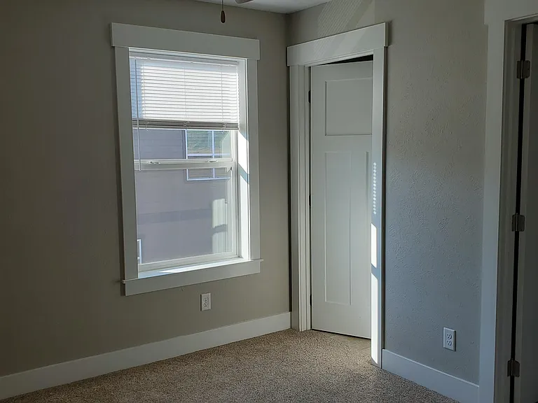 Upper bedroom. Both have walk-in closets and private full bathrooms.