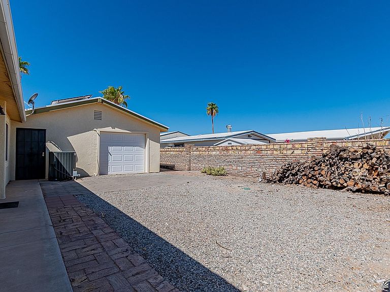 Side yard and detached garage