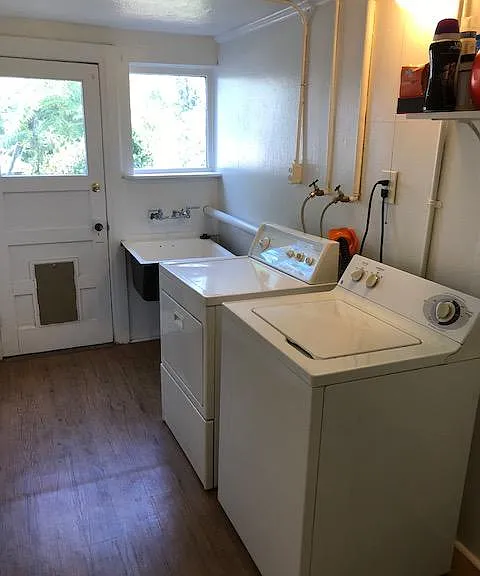 Laundry Rm shared w/1 upstairs tenant accessed through hallway door