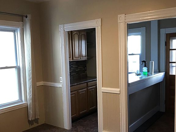 Kitchen looking into pantry and back door is to the right.