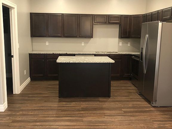 Kitchen with granite countertops