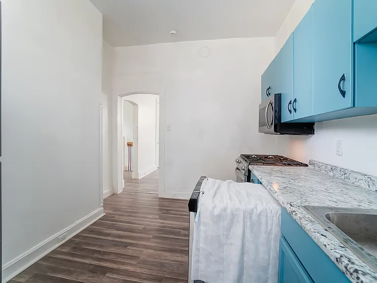 Sleek, well-designed kitchen with ample counter space and appliances