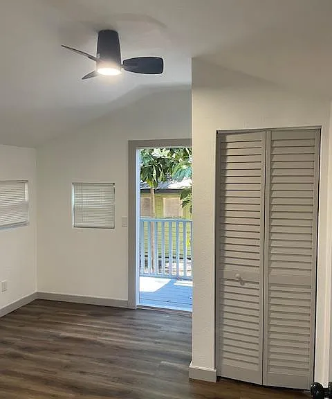 bedroom features convenient backdoor to backyard access