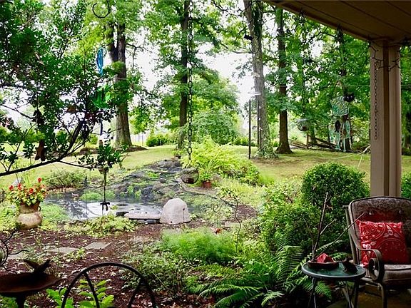 2000 gallon KOI Pond with a water fall---most relaxing & beautiful.