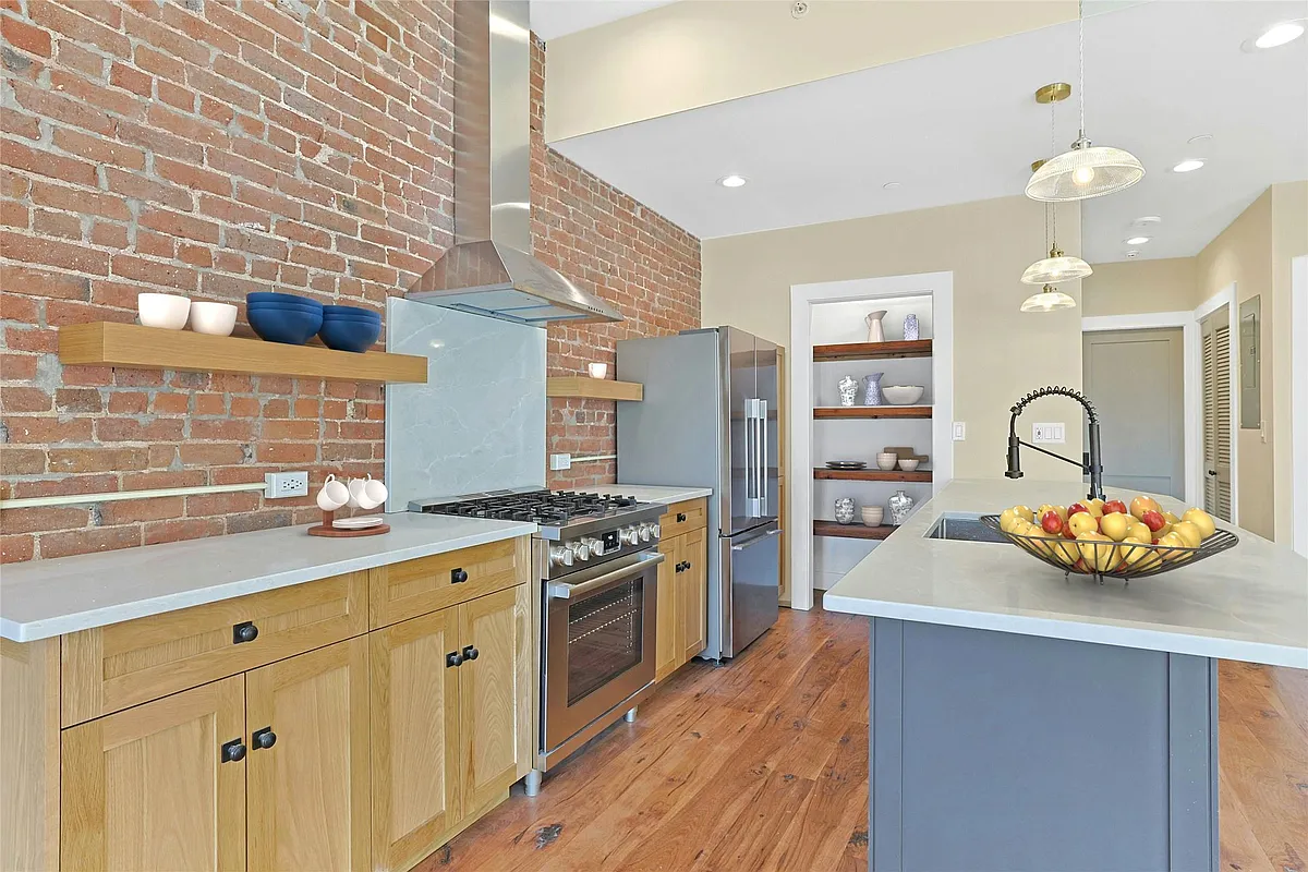 Kitchen featuring all new stainless steel appliances and custom pantry. - 19 Main St #3