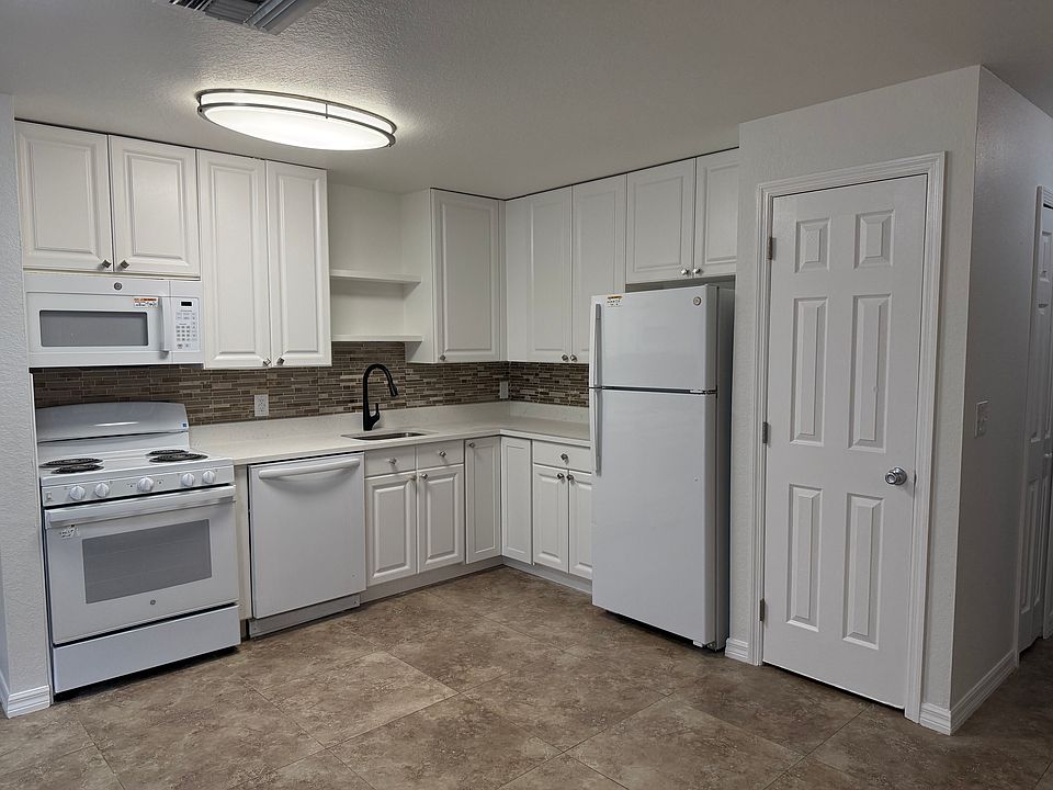 Kitchen is completely renovated with all new appliances, granite countertop, new cabinets and a beautiful backsplash.