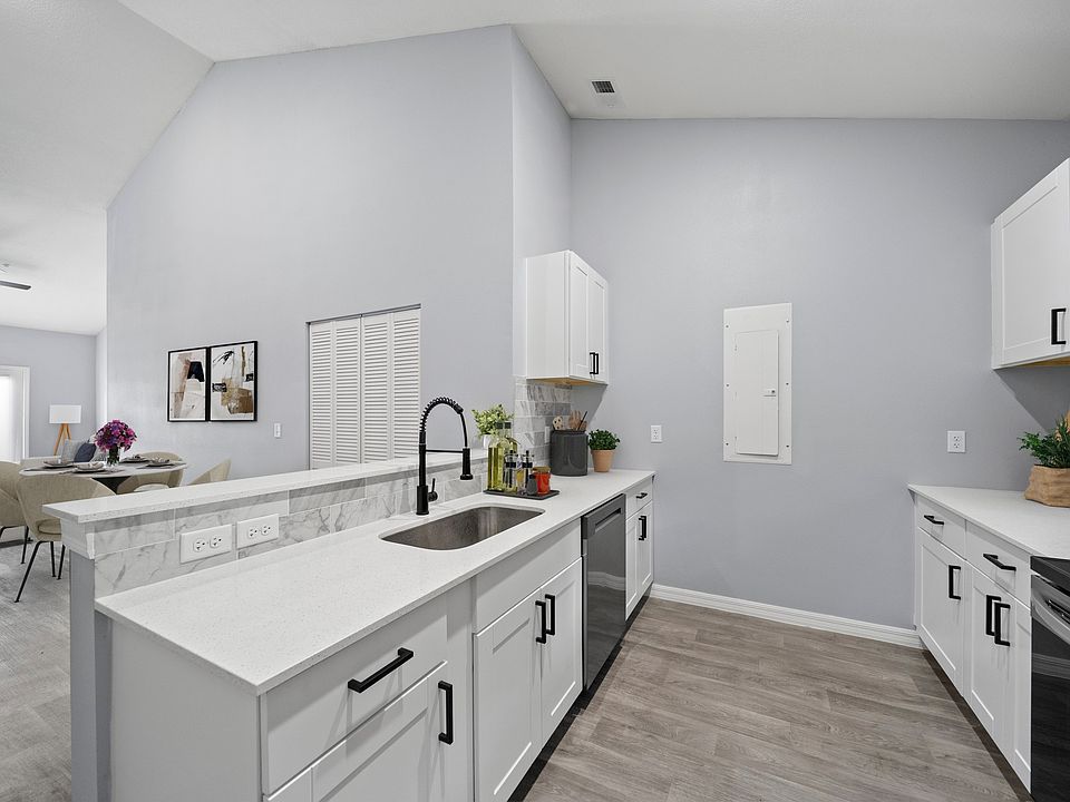 Kitchen and dining room photo from model home