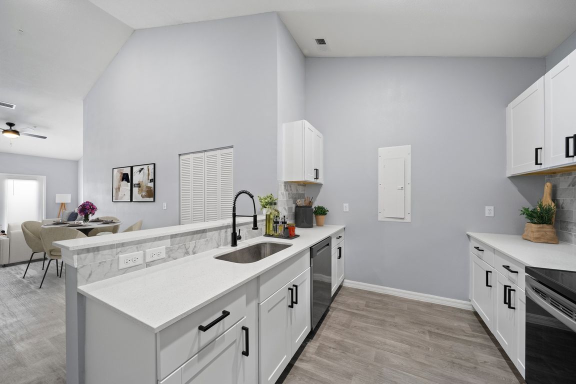 Kitchen and dining room photo from model home