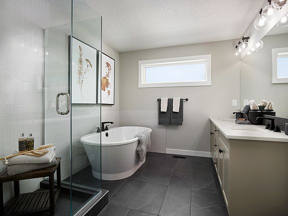 Indulge in luxury in this stylishly designed bathroom, where modern comfort meets timeless elegance.