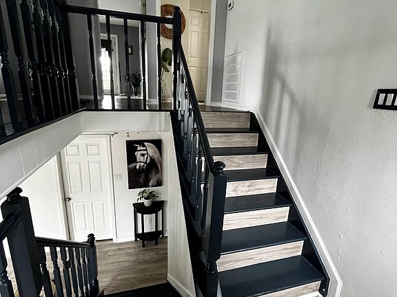 Entry way view. Split floor plan with majority of living area upstairs