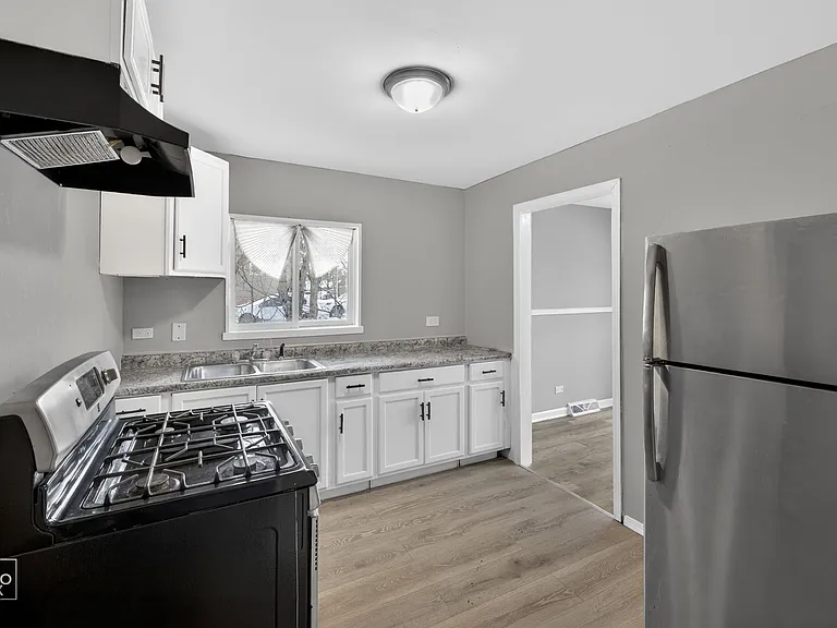 13041 S Eberhart Ave — Photo 5