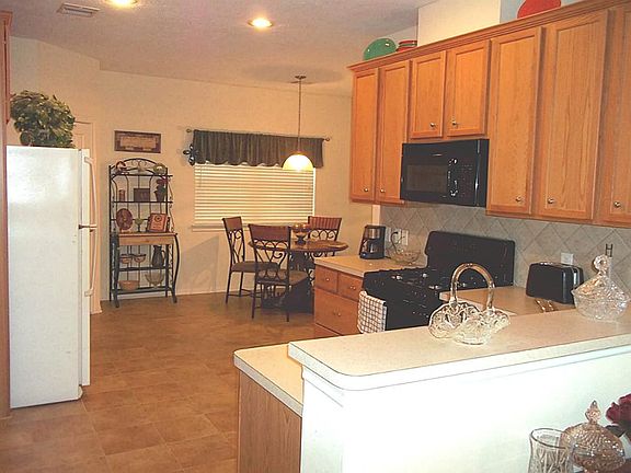 Kitchen with gas range and lots of cabinets and counter space