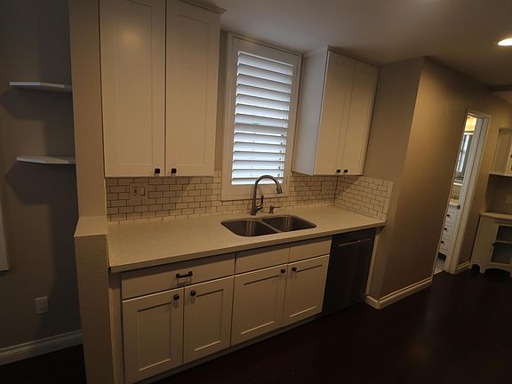 Kitchen with sink and dishwasher