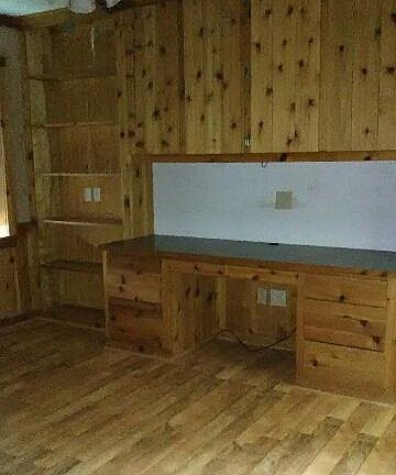 3rd Bedroom with built in shelves & desk