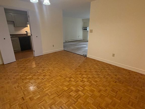 Nice sized dining room off kitchen with parquet flooring