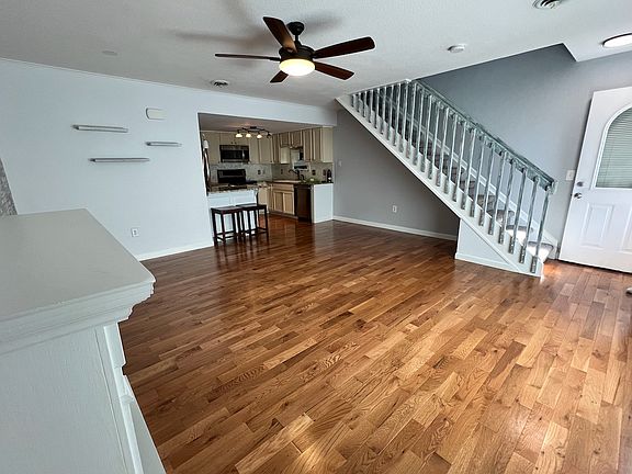 Main floor living area. Hardwood flooring throughout first floor.