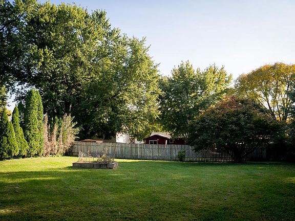 This backyard has plenty of space to be active or for garden