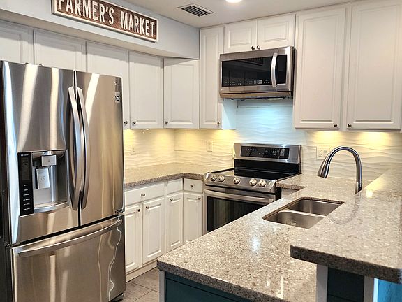 Please note that the microwave will be replaced with an oven hood prior to tenant occupying the home.