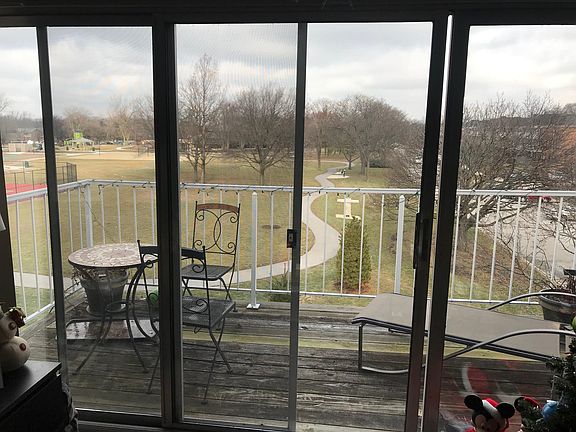 Large balcony with sliding glass and screen doors