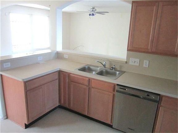 kitchen open to den, SS dishwasher