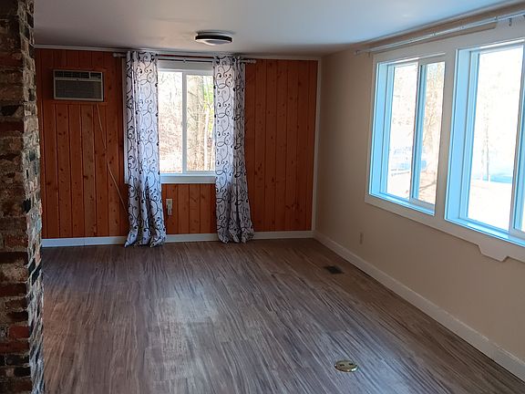 New Luxury Vinyl Flooring and new windows with view of Rice Lake