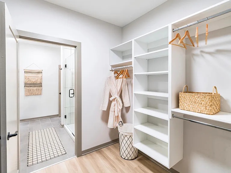 Custom built-ins and an oversized layout add everyday ease to your spacious closet.